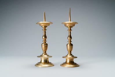 A pair of brass alloy candlesticks, Italy, 17th C.