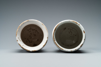 Two Dutch Delft blue and white albarello type drug jars, 18th C.