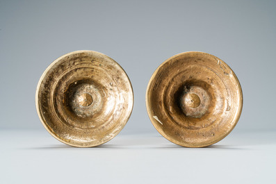 A pair of brass alloy candlesticks, Italy, 17th C.