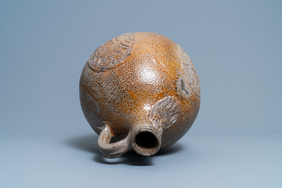A large German stoneware bellarmine jug with three armorial medallions, Frechen, 1st half 17th C.