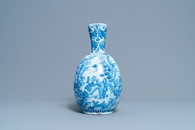 A large Dutch Delft blue and white chinoiserie ewer, 17th C.