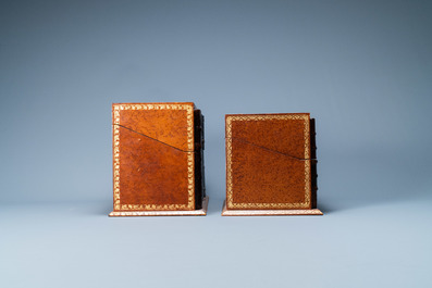Four trompe-l'oeil storage boxes made from old book covers, France, 20th C.