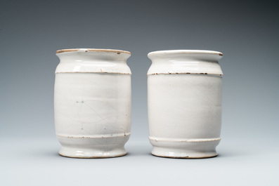 A pair of Dutch Delft blue and white albarello type drug jars, 18th C.
