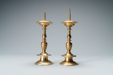 A pair of brass alloy candlesticks, Italy, 17th C.