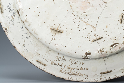 A large polychrome 'battle scene' dish, Francesco Grue workshop, Castelli, Italy, 1st half 17th C.