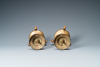 A pair of brass alloy candlesticks on lion feet, The Netherlands, 1st half 15th C.