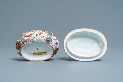 A polychrome and gilded Dutch Delft spice box and cover, early 18th C.
