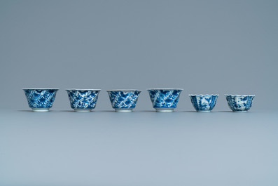 Six Chinese blue and white cups and saucers and eleven miniature vases, Kangxi