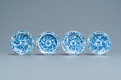 Six Chinese blue and white cups and saucers and eleven miniature vases, Kangxi