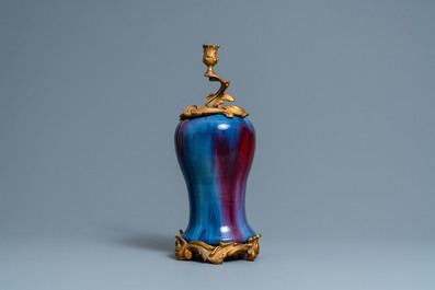 A Chinese flamb&eacute;-glazed vase with gilt bronze candelabra mount, 19th C.