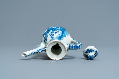 A Dutch Delft blue and white chinoiserie wine ewer and cover, 18th C.