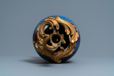 A Chinese flamb&eacute;-glazed vase with gilt bronze candelabra mount, 19th C.
