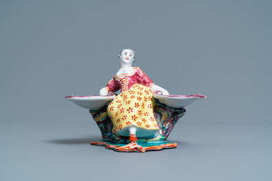 A Dutch Delft polychrome petit feu figural salt cellar, 18th C.