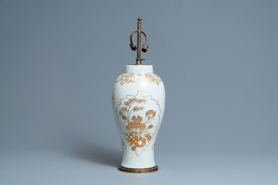 A Chinese parcel-gilt bianco-sopra-bianco vase mounted as a lamp, Qianlong