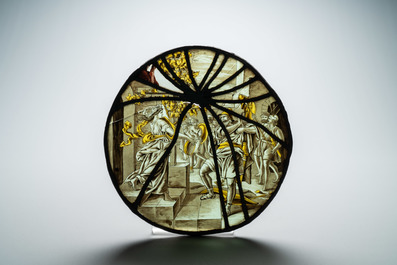 A pair of grisaille and silver yellow painted glass roundels with biblical scenes, France, 17th C.