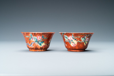 A pair of Chinese famille rose 'faux-bois' cups and saucers, Yongzheng/Qianlong