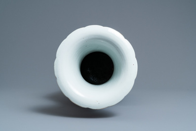 A Chinese famille rose molded 'nine peaches' vase, 19th C.