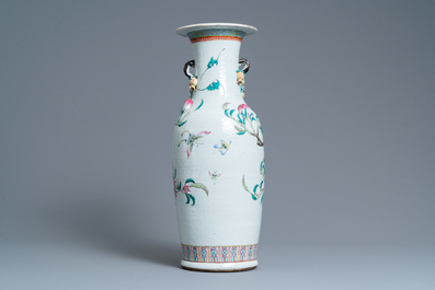 A Chinese famille rose molded 'nine peaches' vase, 19th C.