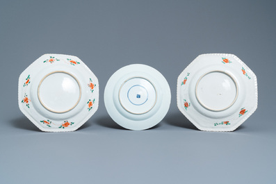 Two Chinese octagonal famille verte dishes and a 'poem' plate, Kangxi