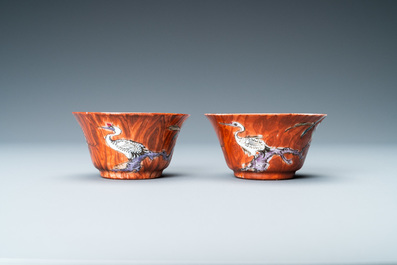 A pair of Chinese famille rose 'faux-bois' cups and saucers, Yongzheng/Qianlong