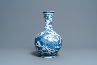 A Chinese blue and white 'dragon and phoenix' vase, Qianlong mark, 19/20th C.