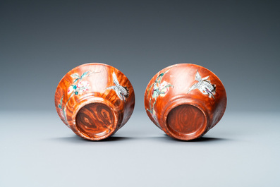 A pair of Chinese famille rose 'faux-bois' cups and saucers, Yongzheng/Qianlong