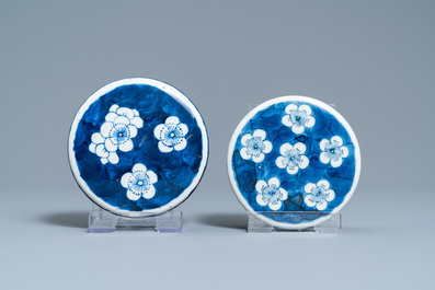 Four Chinese blue and white 'antiquities' jars and covers, 19th C.