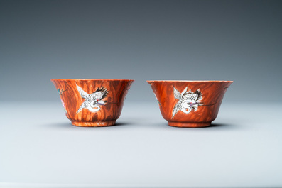 A pair of Chinese famille rose 'faux-bois' cups and saucers, Yongzheng/Qianlong
