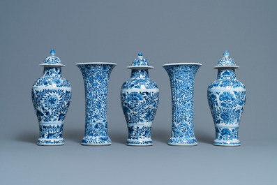 A Chinese blue and white five-piece garniture with floral design, Kangxi