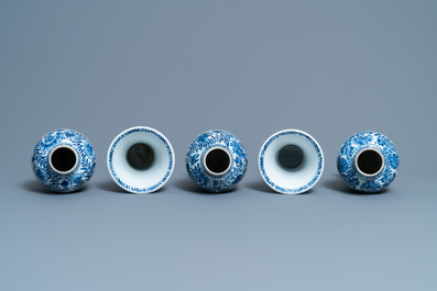 A Chinese blue and white five-piece garniture with floral design, Kangxi