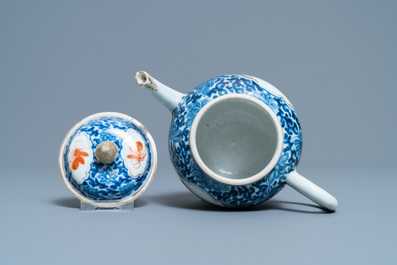 A Chinese blue, white and grisaille teapot and cover, 19th C.