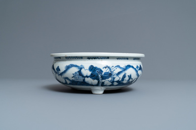 A Chinese blue and white tripod censer with figures in a mountainous landscape, Kangxi