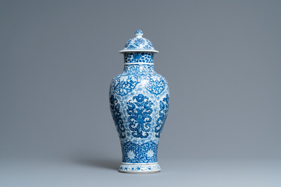 A Chinese blue and white vase and cover with floral design, Kangxi