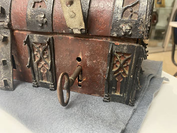 A partly red painted cast iron casket, France, 15th C.