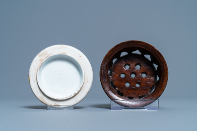 A Chinese doucai jar and an iron-red black-ground jar, 19th C.