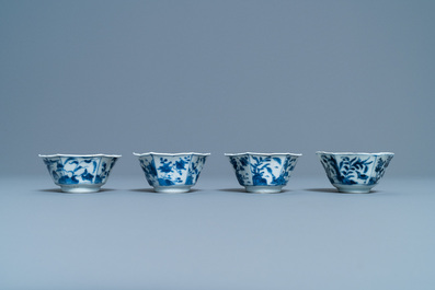 A pair of Chinese blue and white vases, a 'lotus' dish and four cups, Kangxi