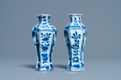 A pair of Chinese blue and white vases, a 'lotus' dish and four cups, Kangxi
