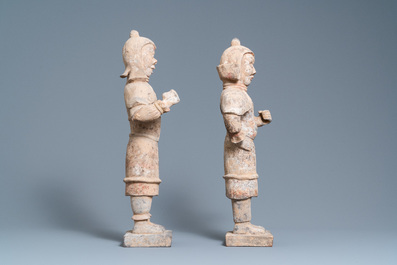 A pair of Chinese painted pottery 'Lokapala' guardian figures, Tang
