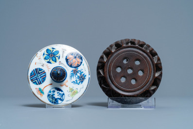 A Chinese doucai jar and an iron-red black-ground jar, 19th C.
