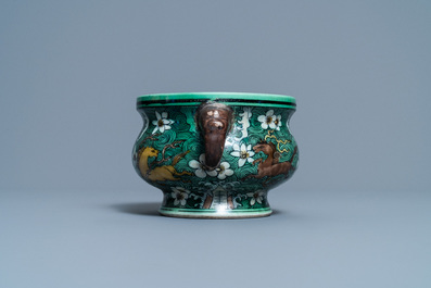 A Chinese verte biscuit 'flaming horses' censer, Jiajing mark, 18/19th C.