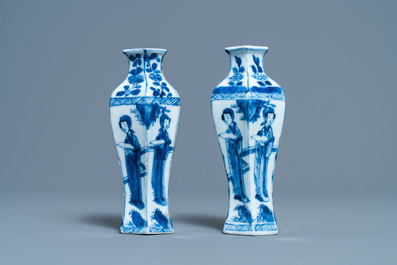 A pair of Chinese blue and white vases, a 'lotus' dish and four cups, Kangxi