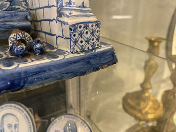 A Dutch Delft blue and white fireplace-shaped box and cover, ca. 1800
