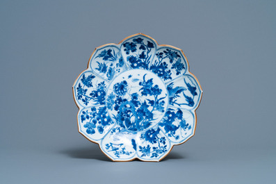 A pair of Chinese blue and white vases, a 'lotus' dish and four cups, Kangxi
