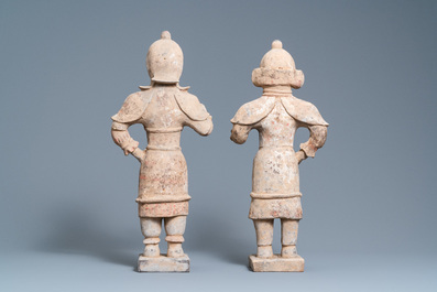 A pair of Chinese painted pottery 'Lokapala' guardian figures, Tang