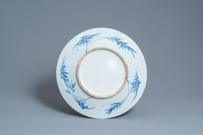 A Chinese famille verte 'yenyen' 'rice production' vase and a large blue and white 'peacock' dish, 19th C.