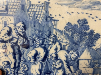 An unusual Dutch Delft blue and white plaque with a village scene, 2nd half 17th C.