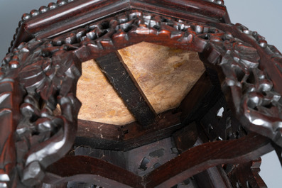 Two reticulated Chinese carved wooden stands, 19/20th C.