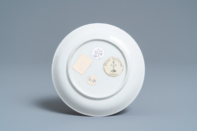 A Chinese famille rose 'bird and insects' cup and saucer, Yongzheng