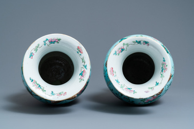 A pair of Chinese famille rose turquoise-ground vases with butterfly handles, 19th C.