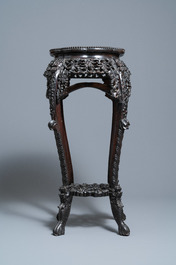Two reticulated Chinese carved wooden stands, 19/20th C.